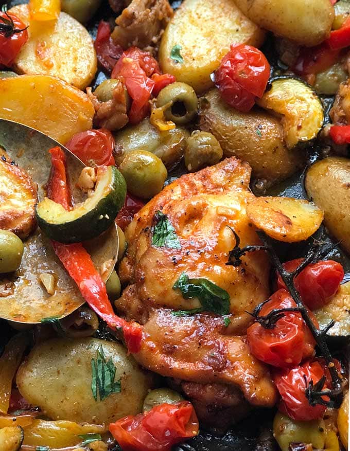 Baked Chicken Thighs with Potatoes, Peppers and Olives