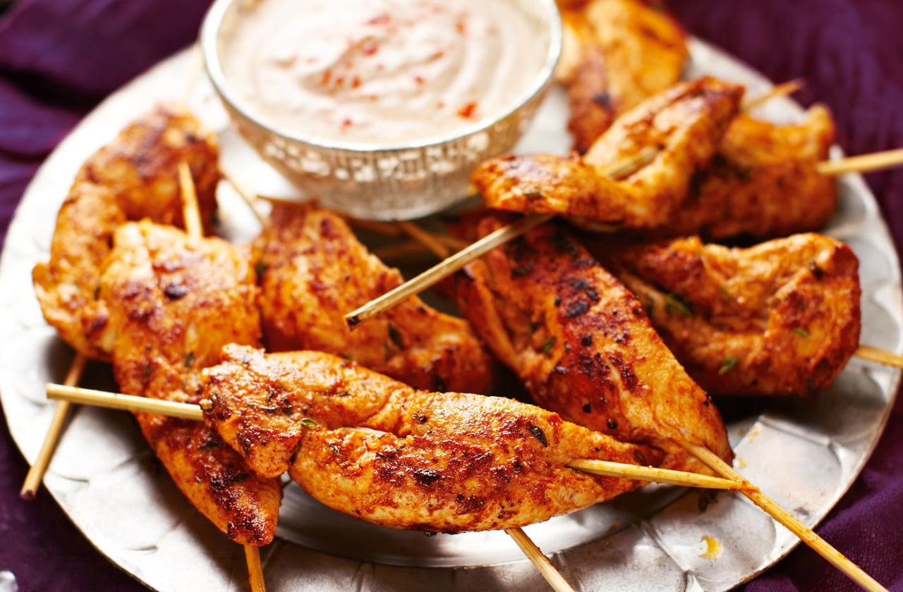 Spanish-style chicken skewers with spicy yogurt dipping sauce